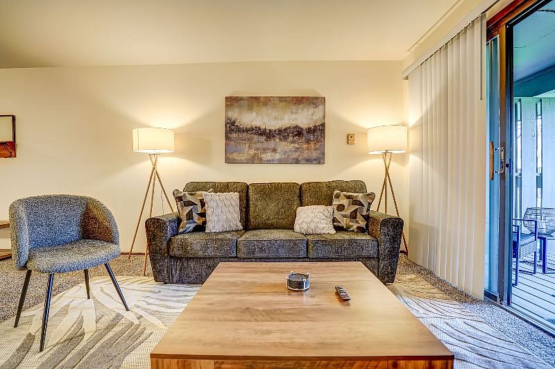 Unwind in ultimate comfort on a plush sectional sofa, perfect for relaxation and rejuvenation.