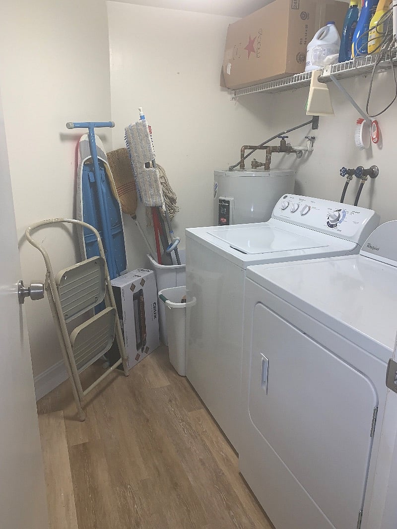 Full size washer and dryer in enclosed laundry room - off of kitchen