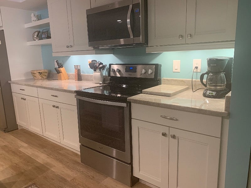 very nice kitchen, well equipped with many small appliances, dishes, pots, pans, silverware, etc.