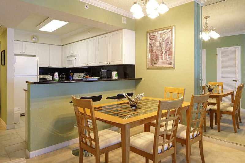 Complete Modern Kitchen w black marble Breakfast Counter. New Large 3 doors fridge, Dishwasher, Microwave, Toaster. Table with 4 Chairs.