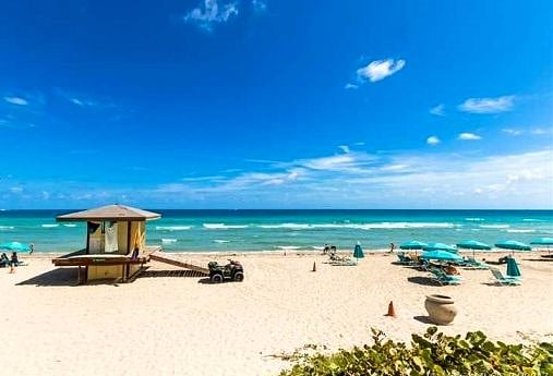 Direct Free Access to Beach from Pool-deck with Showers and by Lifeguard Station.