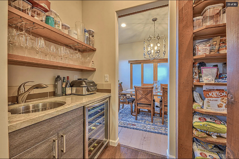Butler's pantry with wine fridge.