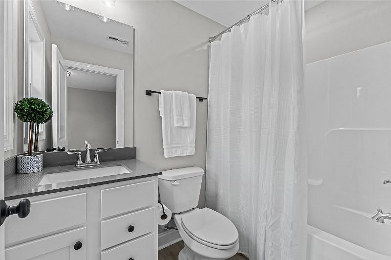 Unit 102B Bathroom with tub/shower combination