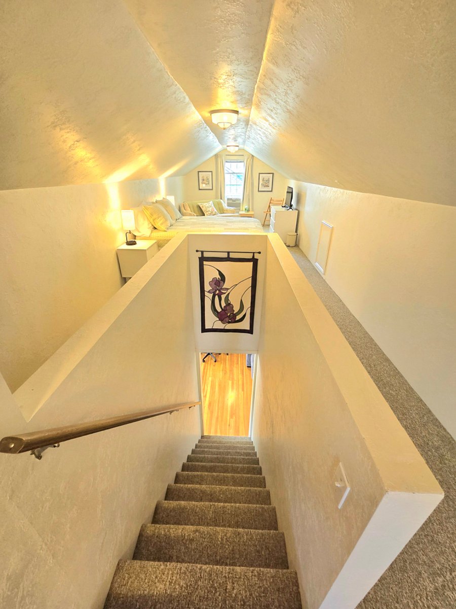 Stairs to upstairs bedroom.