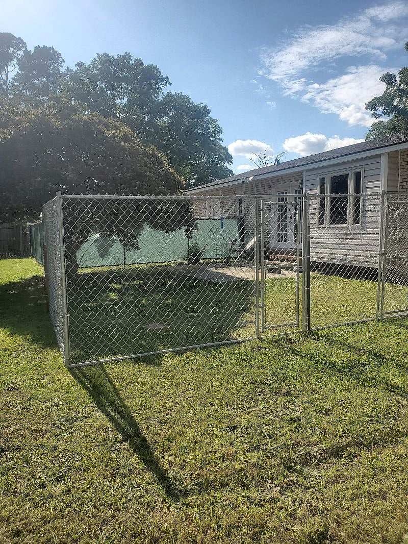 Fenced Dog Yard off back patio.