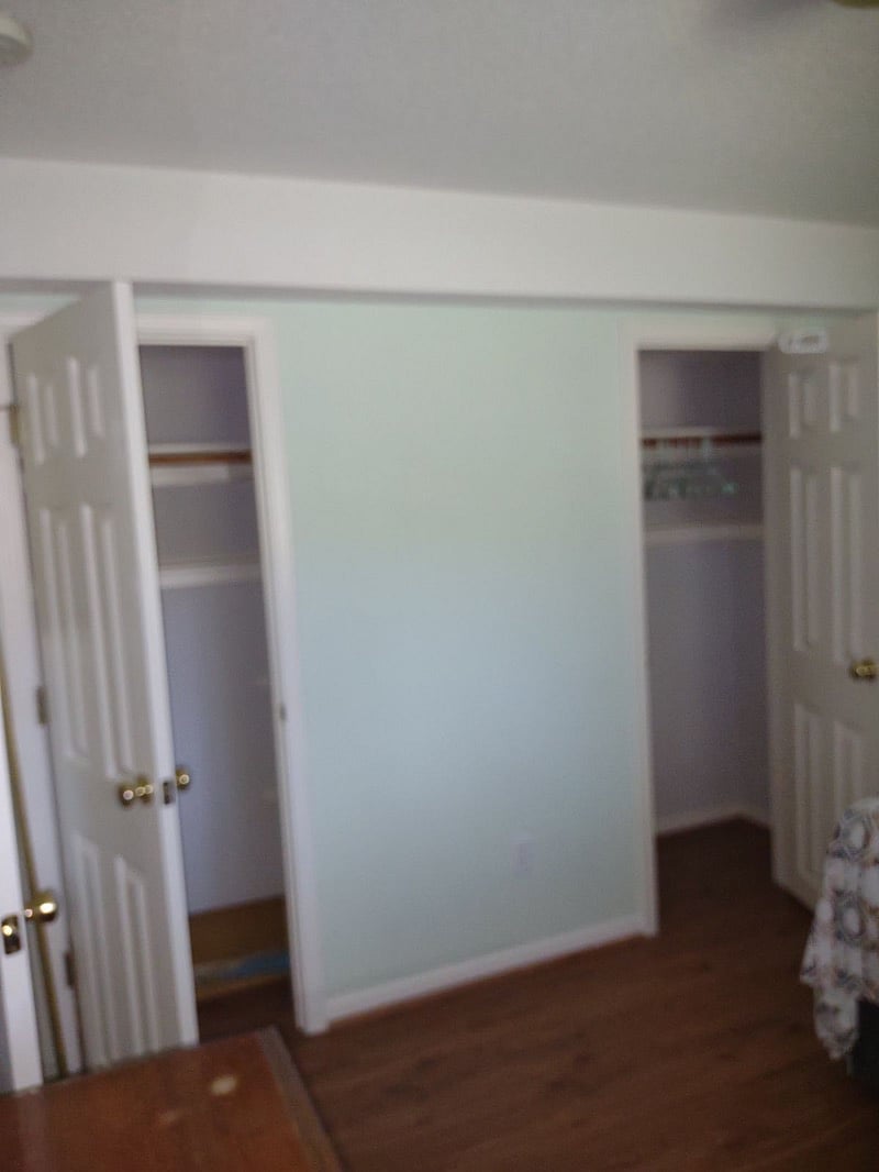 Lots of closet space open shelves between doors