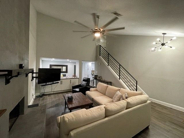 Flexible wall mount for TV, gas fireplace, and large remote controlled fan.