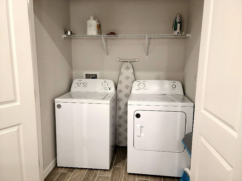 Washer and dryer conveniently located off kitchen.