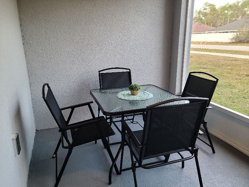 Enjoy some time on the screened-in lanai.