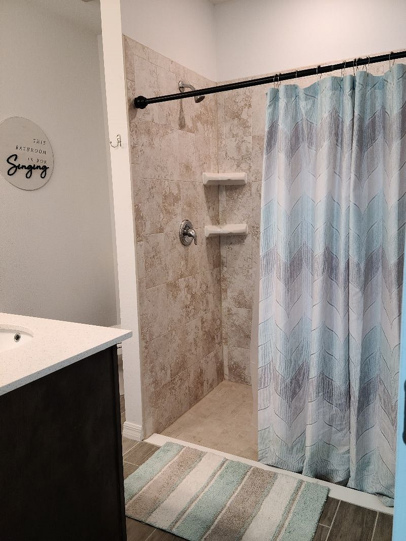 Primary bathroom shower.