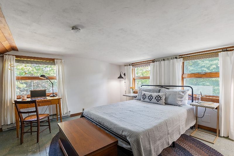 Upstairs Queen Bedroom.
Note: To get to this bedroom you have to walk through the first bedroom with 3 twin beds. There is a door that seperates this room from the first bedroom