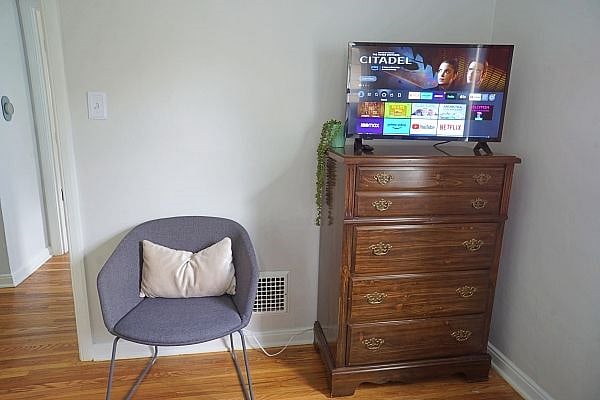 Primary Bedroom with a Queen Bed, Large Closet and Smart TV