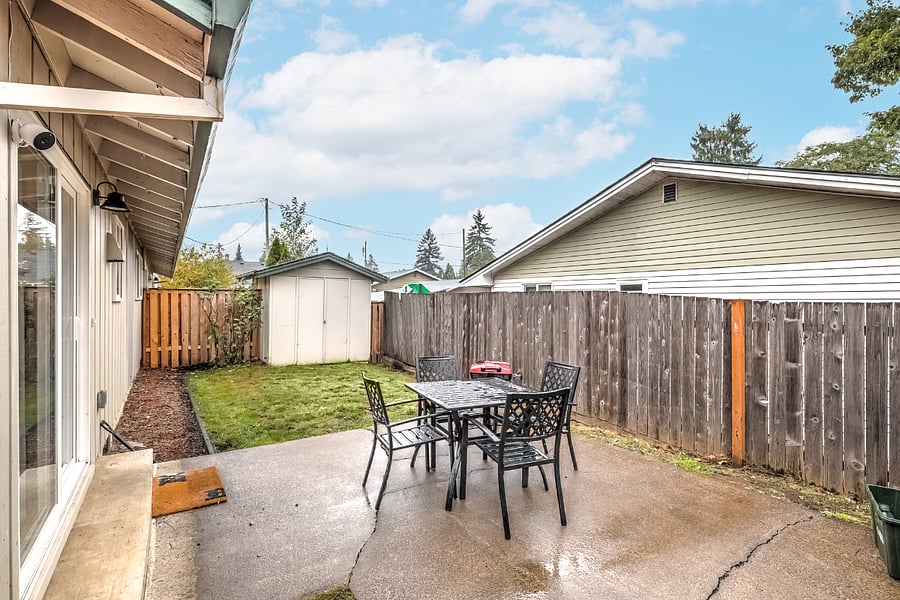 Patio with dininng table and barbeque for outdoor living