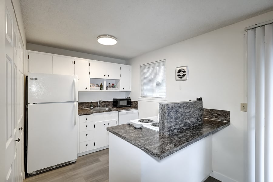Full size fridge, dishwasher, range, microwave and plenty of cabinet storage