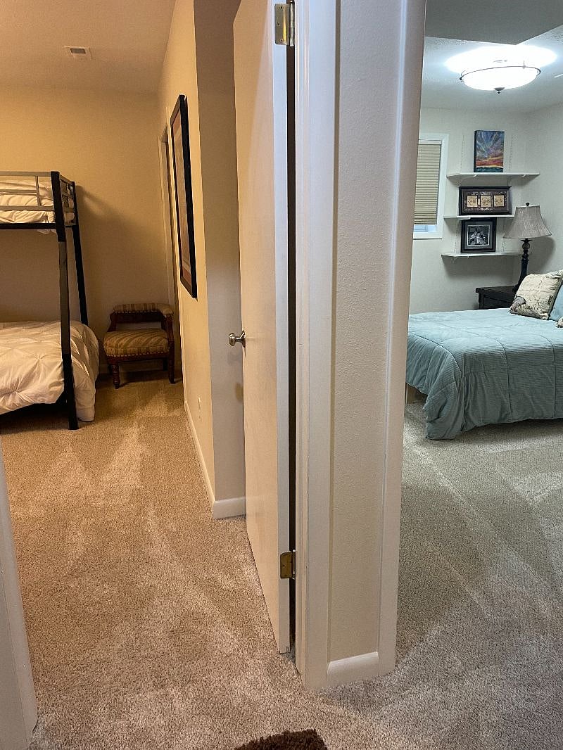 Hall to both rooms in basement