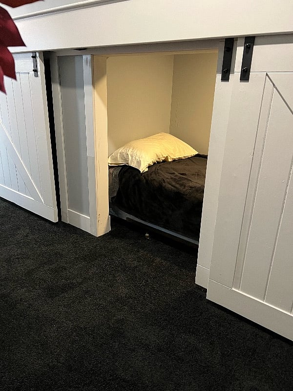 Upstairs Cubbies have XL-Twin Bed, Light, Storage, and USB Charging Port.