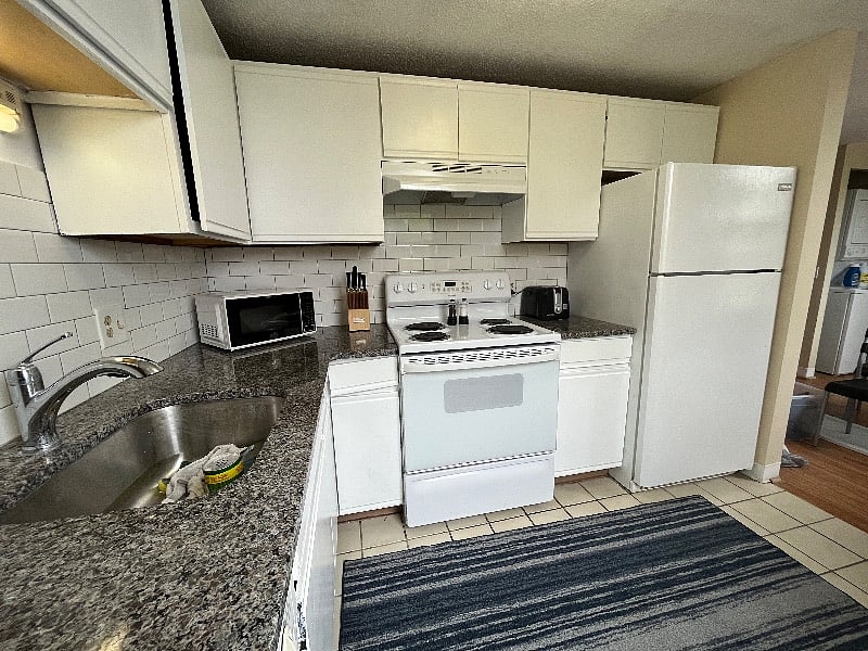 Hard to find a well-equipped kitchen like this in a one bedroom with dishwasher and garbage disposal.