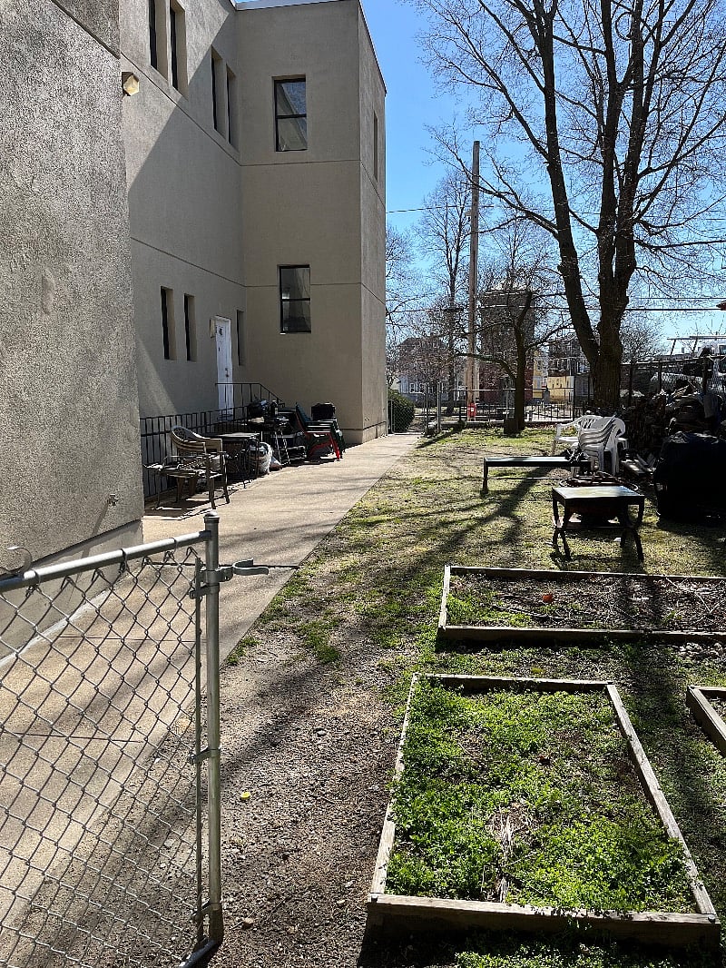 Cozy outdoor space for dog walks or lounging. 
