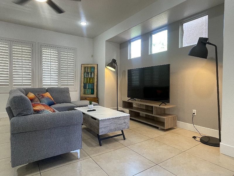 Enjoy the comfortable couch & 65in Smart TV. Highest speed Cox Wi-Fi included.