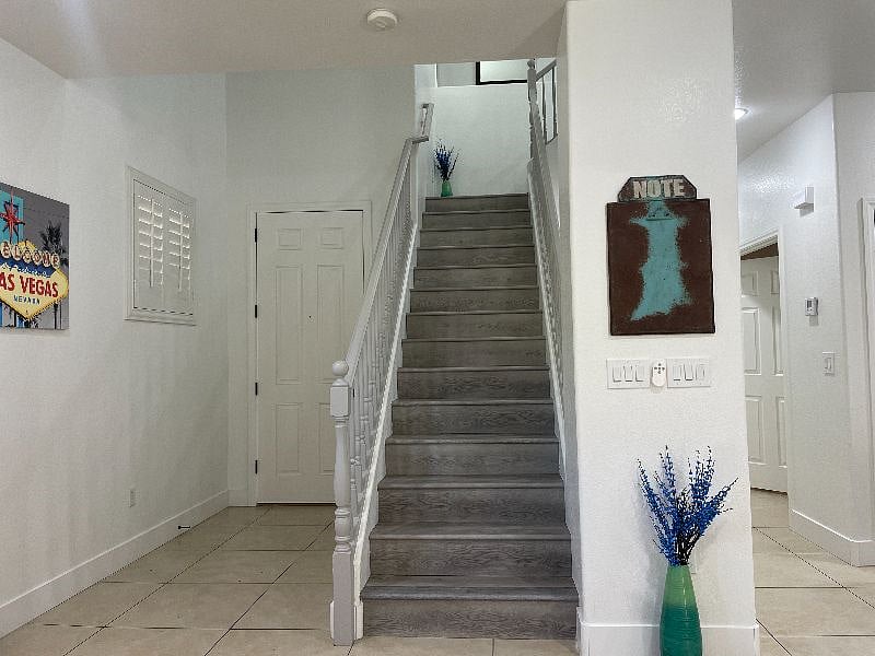 Head upstairs for the 2 standard bedrooms, laundry & Master