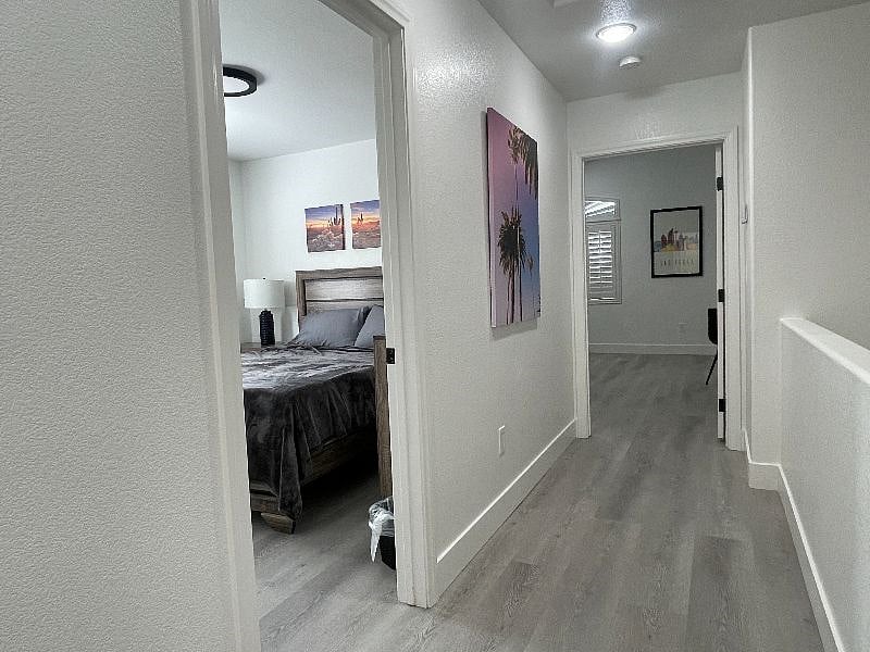 Hallway to other bedroom and Master