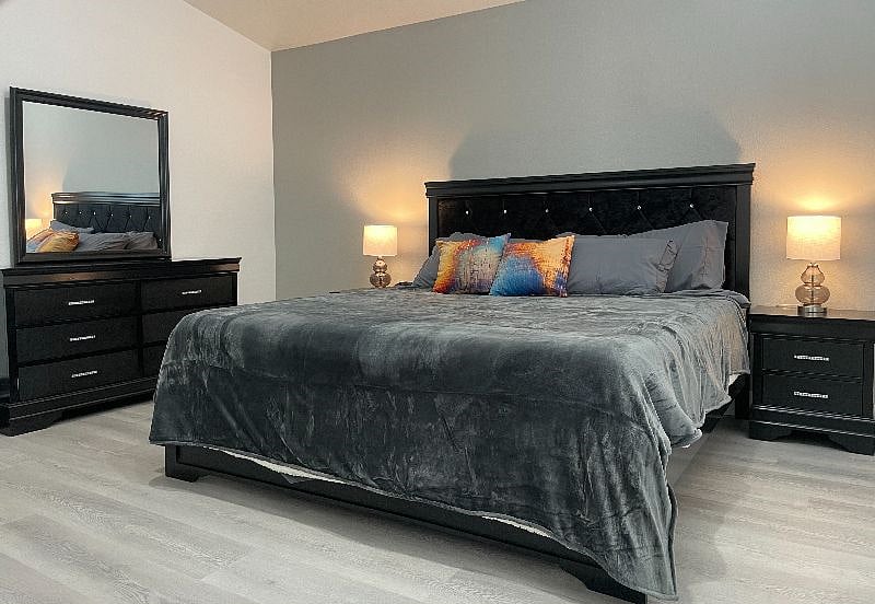 The dresser mirror and night stands are a dream come true
