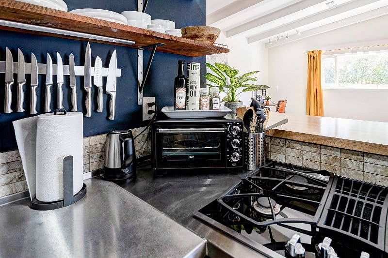 We have a gas-powered stove top, toaster oven, and we have olive oil and vinegar as a staple ingredient.