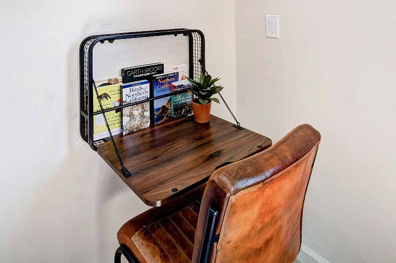 The little desk is small but cozy enough to get the day's work done.