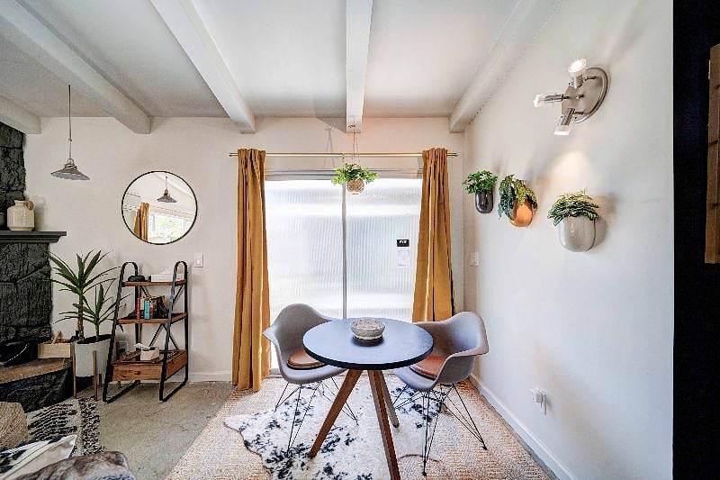 This sitting area is perfect for your morning coffee or a card game that is provided to our guests.