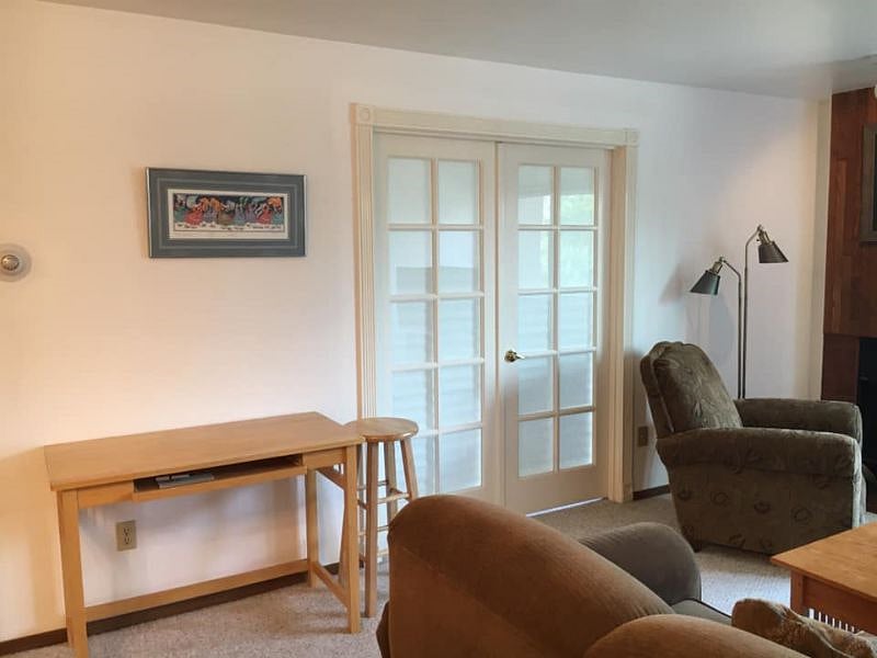 Living room w/french door to bdrm closed for privacy