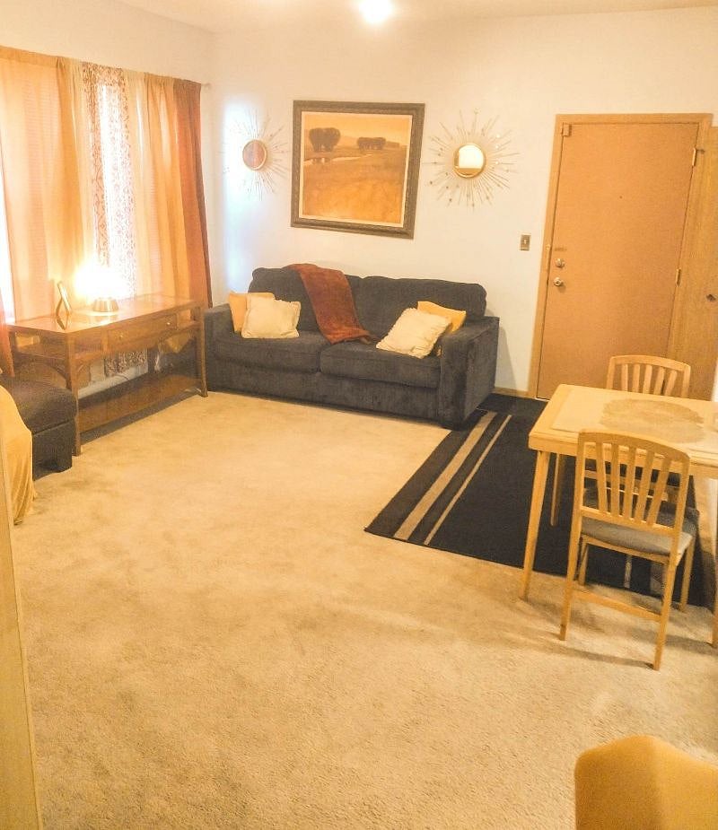 Front Door and Couch in Living Room