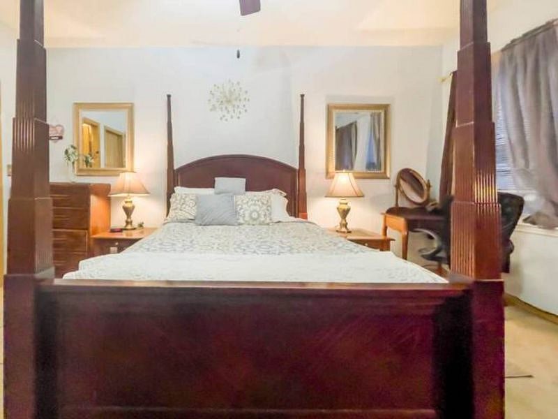 Another View of Queen Size Bed In Master Suite