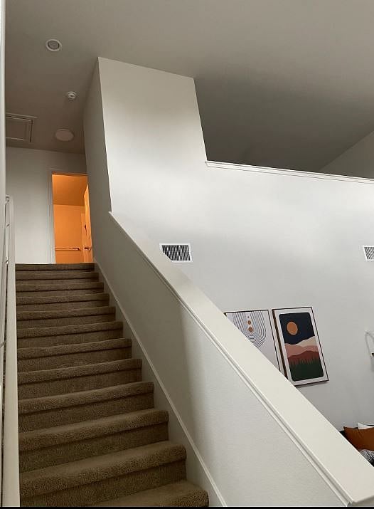Guest room and private living space located upstairs