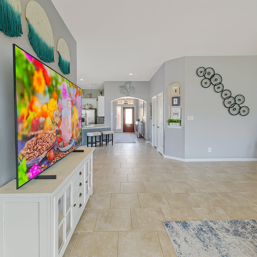 75 inch Samsung Smart TV in living room where you can relax and enjoy your favorite shows.