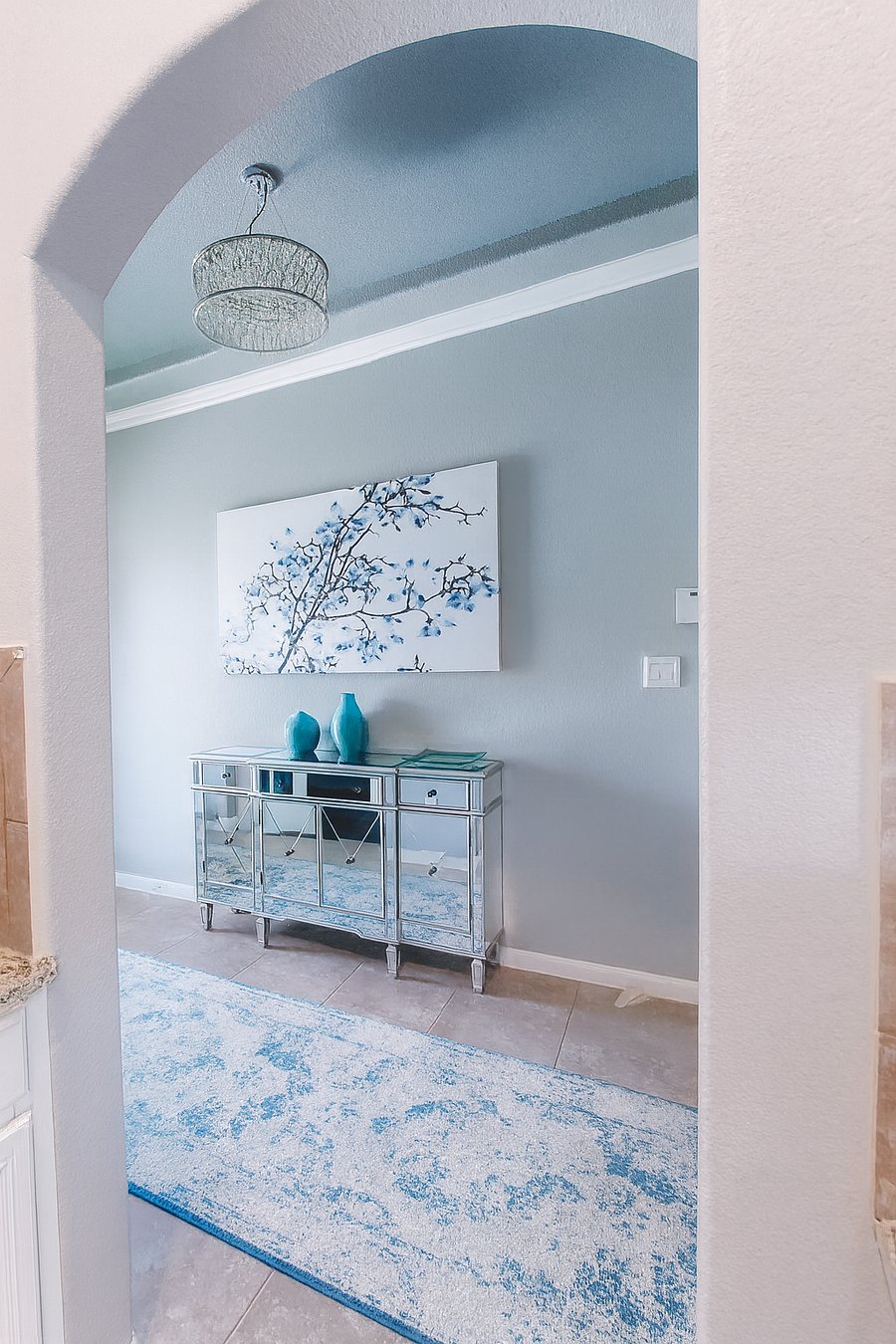 Well decorated and inviting hallway.