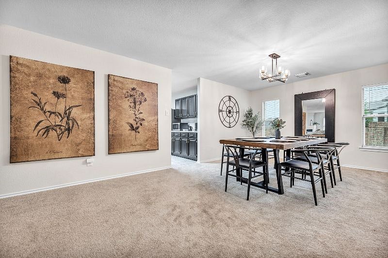 Formal dining area connects directly into the kitchen.