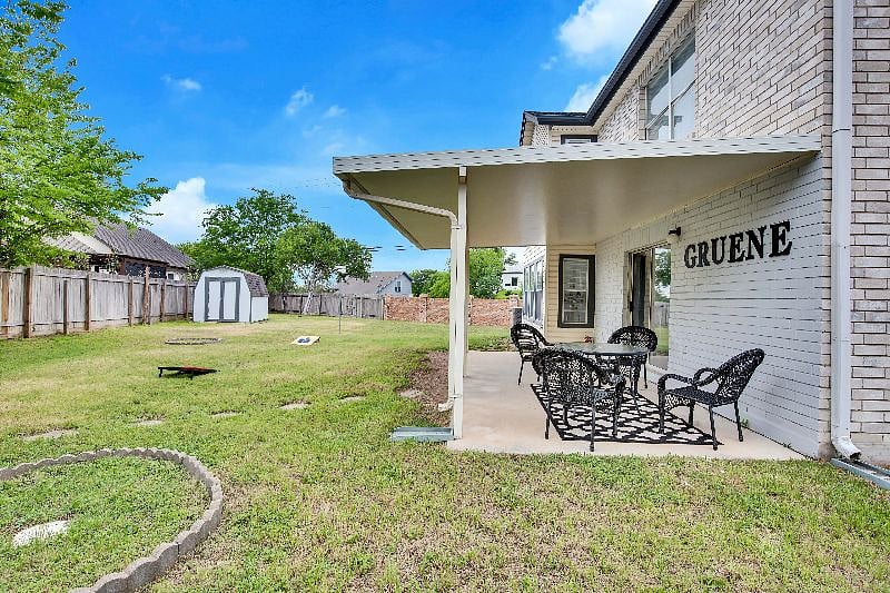 Large open backyard space for outdoor activities and gatherings.