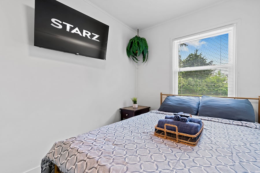 Unwind in a plush full-size bed and stream your favorite shows on your personal smart TV. This cozy, inviting room is your perfect sanctuary to relax, recharge, and wake up energizedready to embrace whatever adventures await.