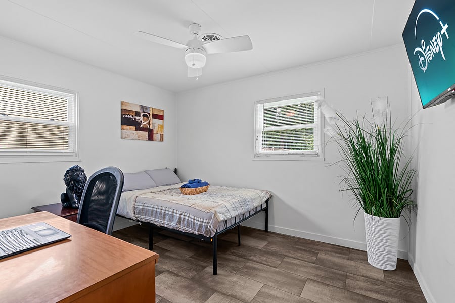Cozy full-size bed, private smart TV, and workspaceall in a modern room designed for comfort and productivity. Perfect for relaxing, recharging, and starting your day refreshed.