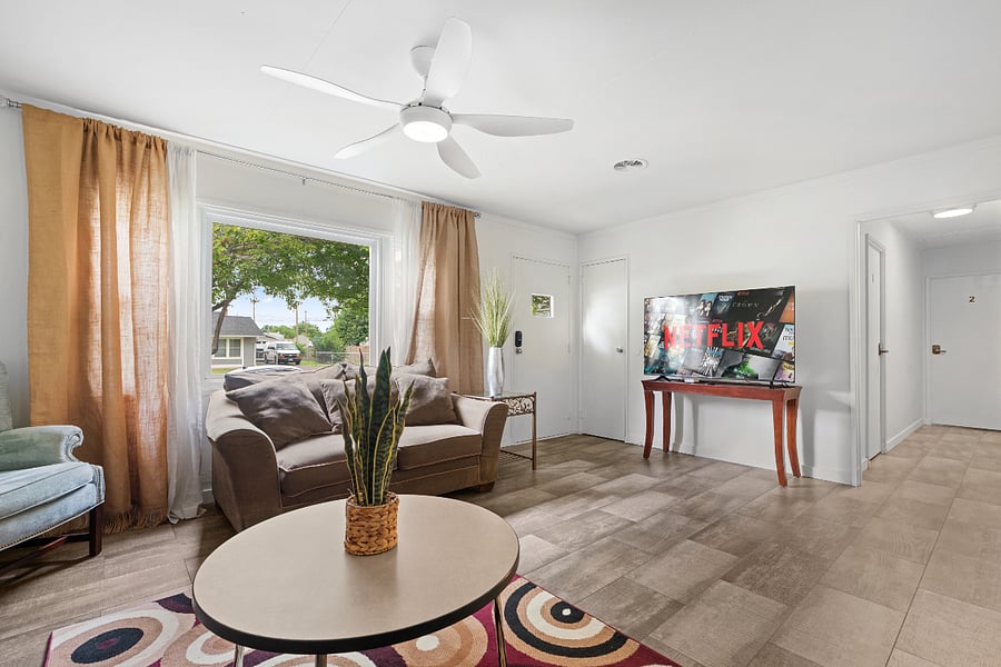 Kick back and unwind in our cozy living room, perfect for relaxing after a long day. Stream your favorite shows on a 50" smart TV with Netflix and all major streaming networksor just sink into the couch and enjoy a peaceful nap. Youve earned it.