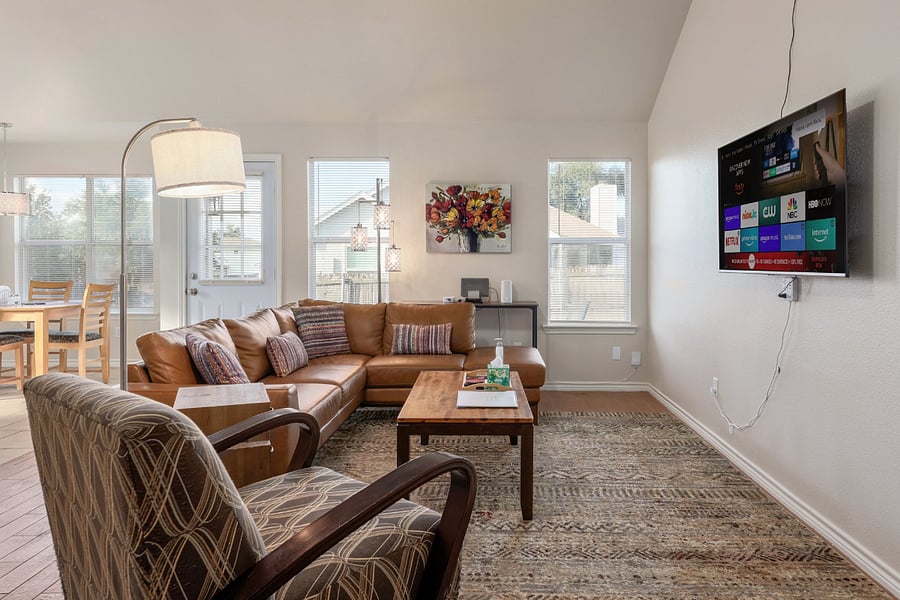 65" smart TV in living room.
