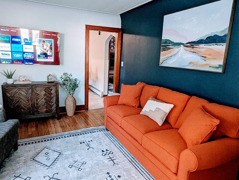 Get cozy in the super comfy living sofa, chairs while you stream your favorite shows/movies.