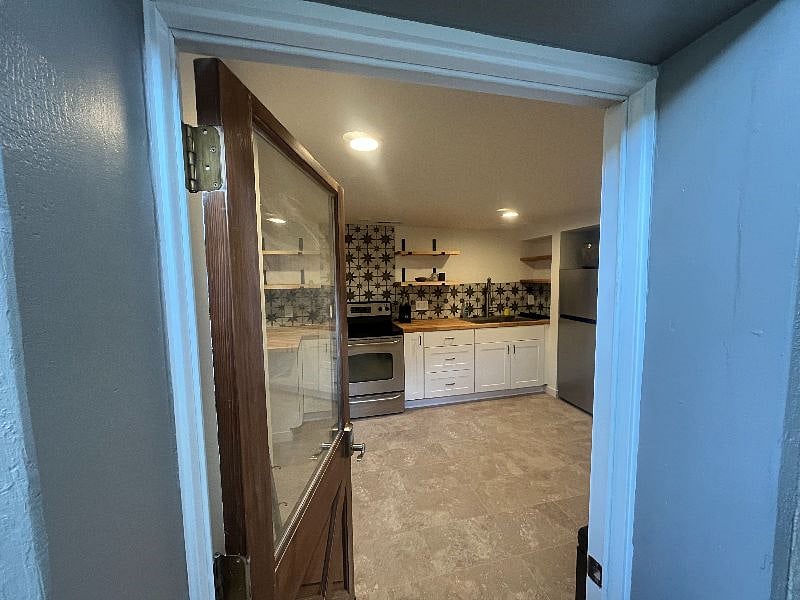 Newly remodeled kitchen with full sized stove/oven.