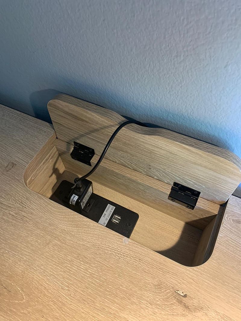 Large desk with built-in outlet and USB ports so you don't have to crawl around to plug in