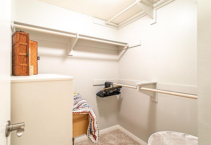 Master bedroom walk-in closet gives you plenty of room to bring your wardrobe with you