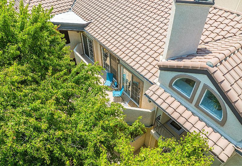 Enjoy the breeze on the balcony on cooler days and stay inside the air conditioning on warmer days, protected by an adobe clay tile roof and lots of natural tree shade