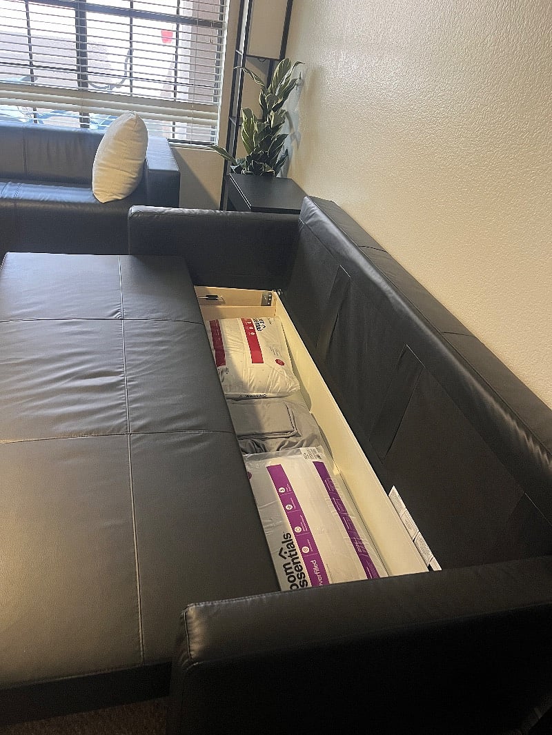 Couch that converts to full-size bed w/storage for couch linens & pillow.