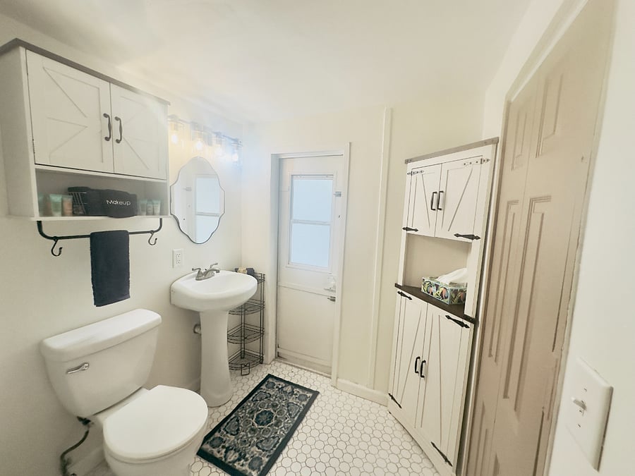 Bathroom w/ Door to Laundry Facilities & Pool