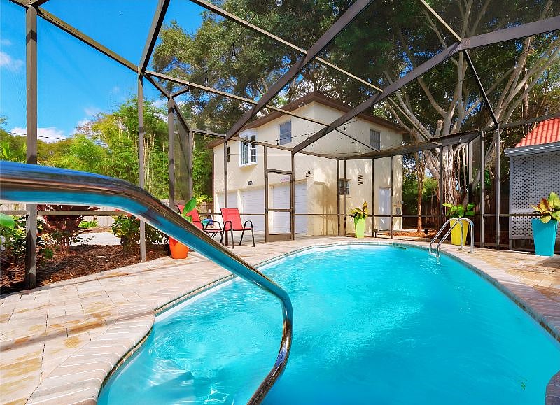 Screen-Enclosed Pool, Pavered Terrace w/ Outdoor Dining Area - SHARED AMENITY