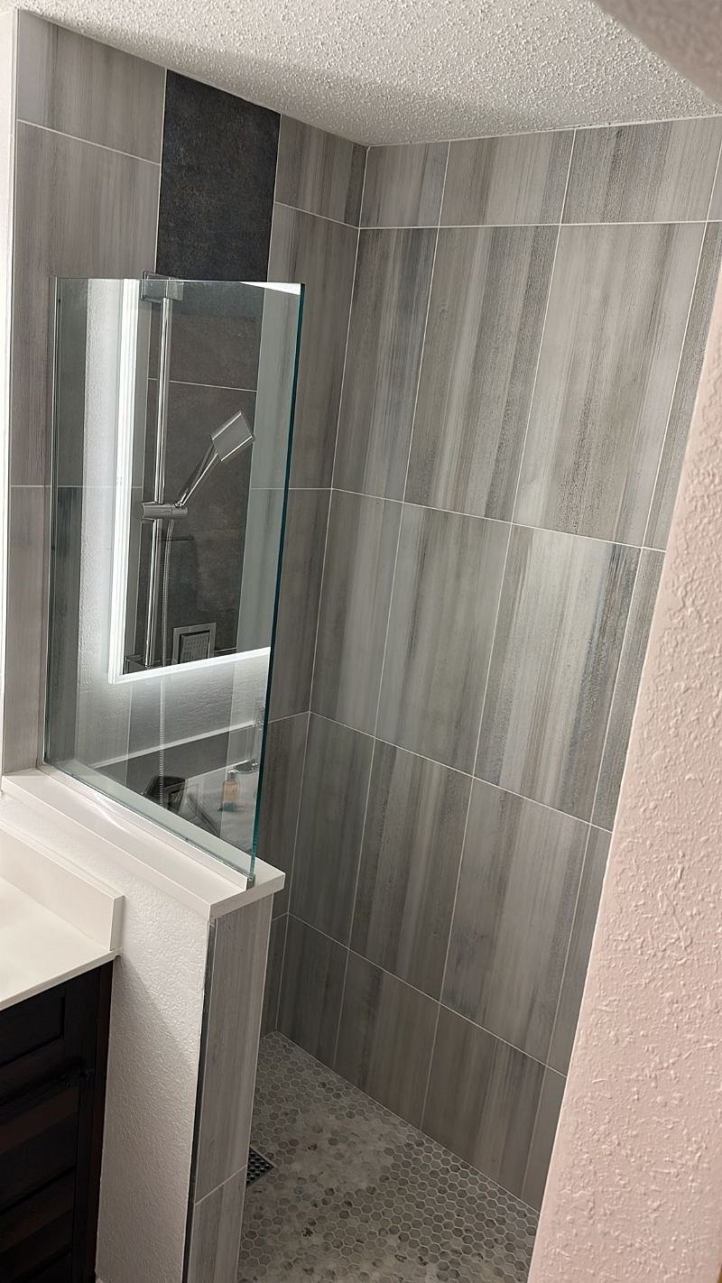 Open Shower with top and side heads for a refreshing shower.